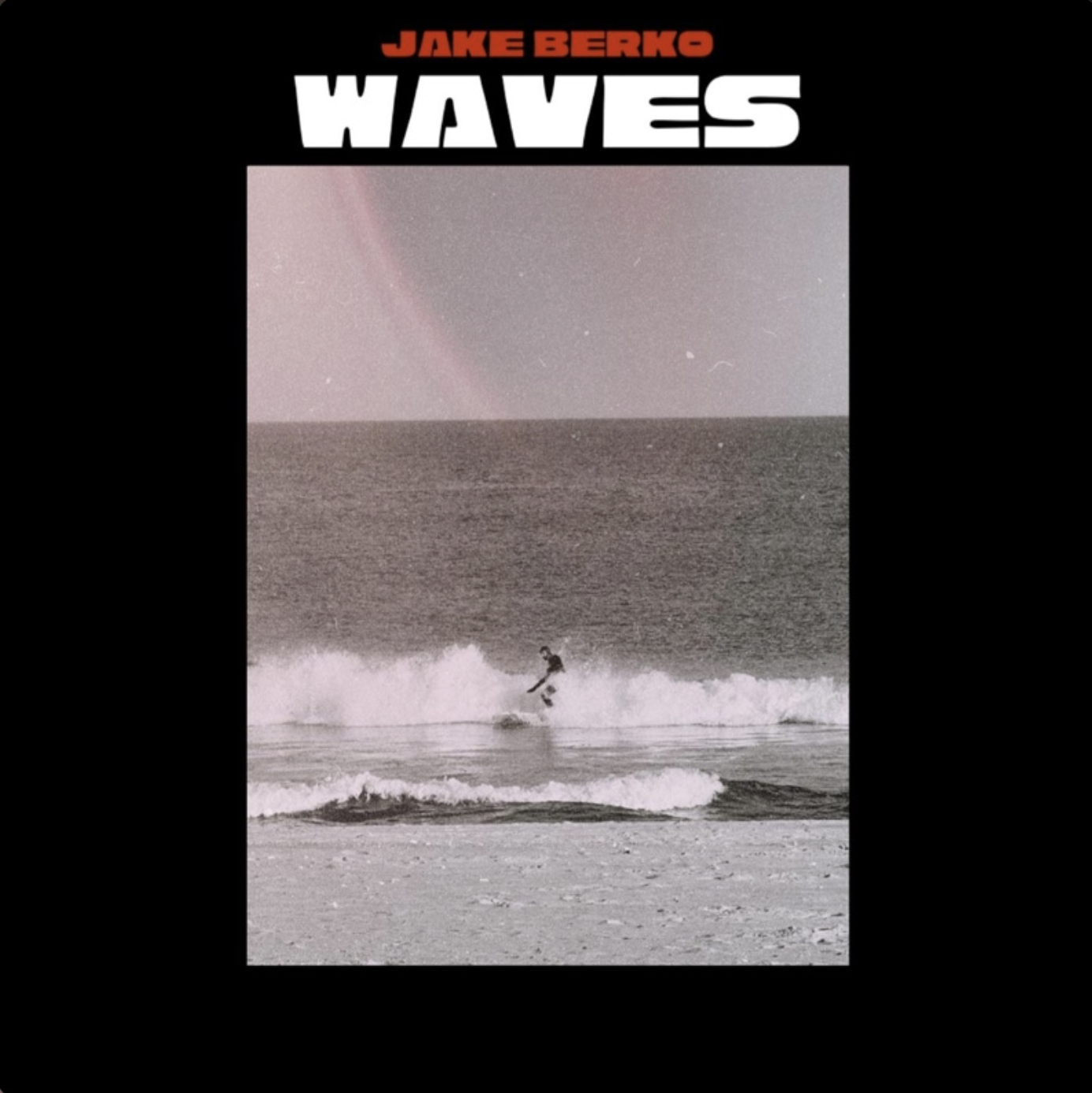 Waves album cover by Jake Berko, featuring a black-and-white photograph of a surfer beneath bold typography